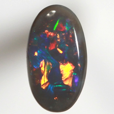 SOLID BLACK OPAL Flag Harlequin pattern. Sparkles of very bright fire red multicolour